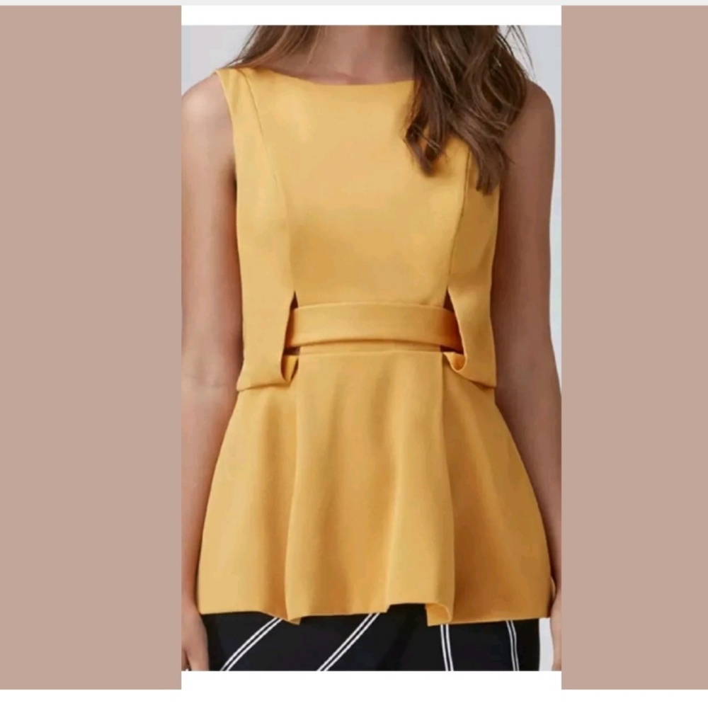 NWOT Finders keepers Marigold peplum top